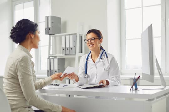 Doctor and patient in consultation room